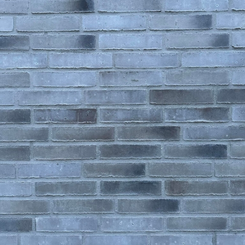 Detaljebillede af murstensvæg på nybyggeri i Skanderborg.